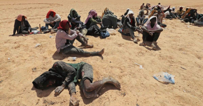 Libya border guards rescue migrants in desert near Tunisia