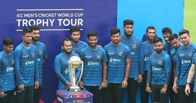 Bangladesh cricketers click photos with trophy of their dreams