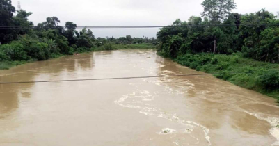 বিপদসীমার কাছ দিয়ে বইছে মনু নদীর পানি 