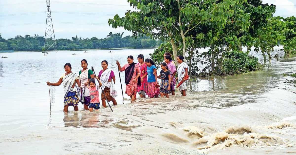 এক মাসের ব্যবধানে দ্বিতীয়বারের মতো বন্যার কবলে পড়লো আসাম। ছবি- Mint